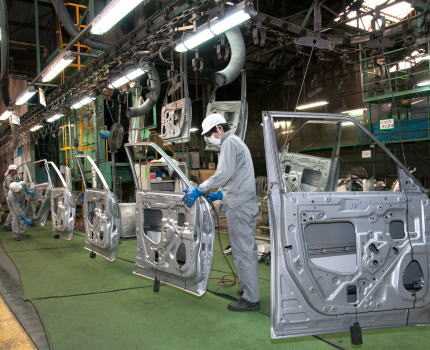 Integrated production line up to assembly and surface treatment